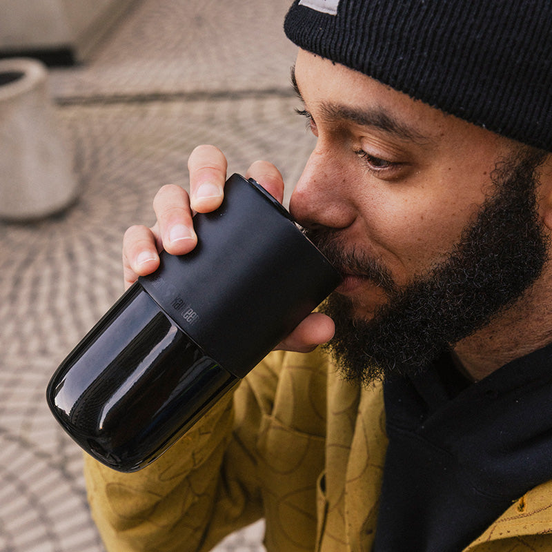 16oz-rise-tumbler-t2 16oz_rise_tumbler_black_man_drink_square.jpg
