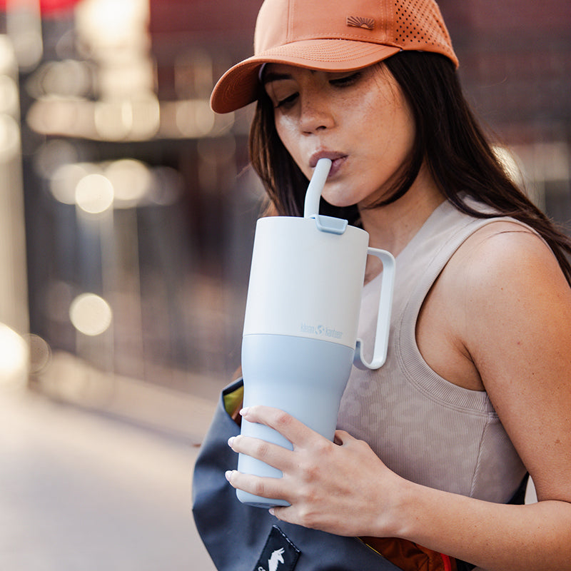 36oz-rise-tumbler-with-straw-lid-h1 36oz_rise_tumbler_straw_girl_sip_square.jpg