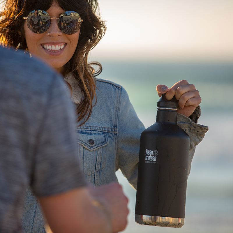 64oz-classic-with-loop-cap-z7 64oz_insulated_classic_black_beach_girl_hand_square.jpg