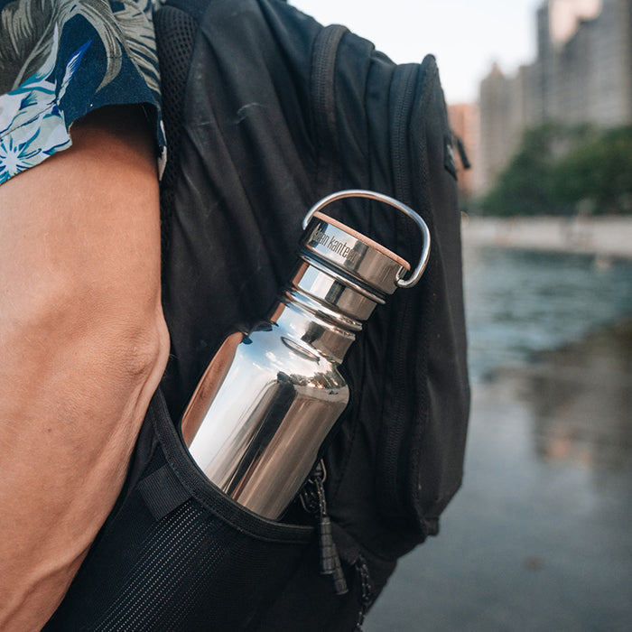 27oz-reflect-with-bamboo-cap-t6 K27SSLRF-MS-BAMBOO_reflect-bottle_backpack_lifestyle.jpg