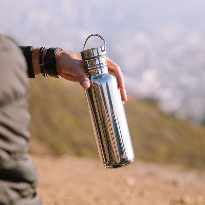 27oz-reflect-with-bamboo-cap-t6 K27SSLRF-MS-BAMBOO_reflect_bottle_hand_lifestyle.jpg