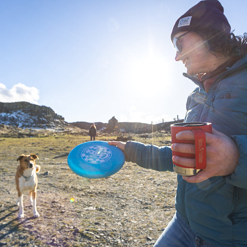 12oz-camp-mug-t5 insulated_camp_mug_12oz_woman_dog_frisbee_square.jpg