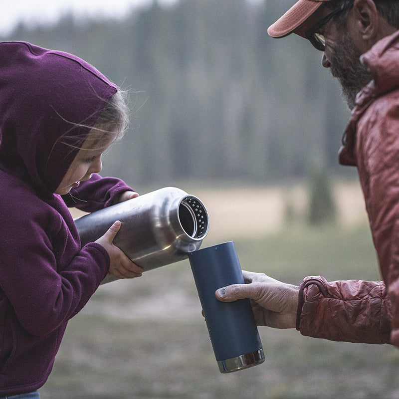 64oz-tkwide-with-loop-cap-u9 tkwide_64oz_bottle_girl_dad_filling_square.jpg